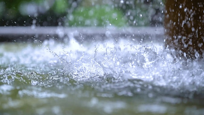 pngtree-summer-beautiful-heavy-rain-raindrops-falling-into-the-water-splashing-water-image_800852